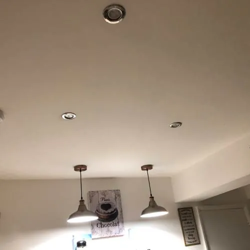 Kitchen ceiling with LED downlights and two pendant lights installed by AK Electrical