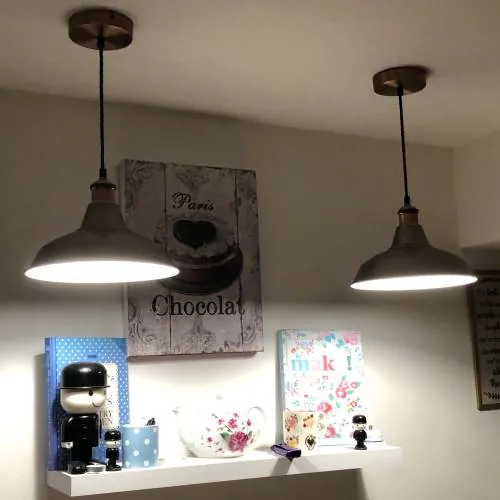 Two industrial-style pendant lights over a kitchen shelf, fitted by AK Electrical